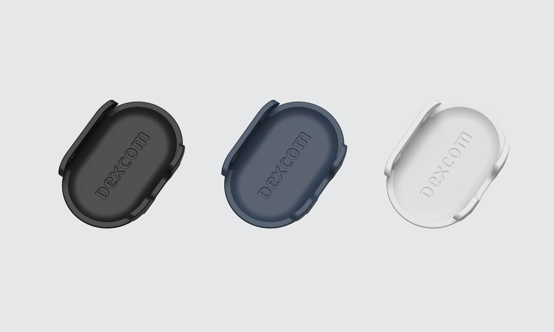 Renderings of 4 different colorways for a snap fit car mount: Black, Navy, and Cream.